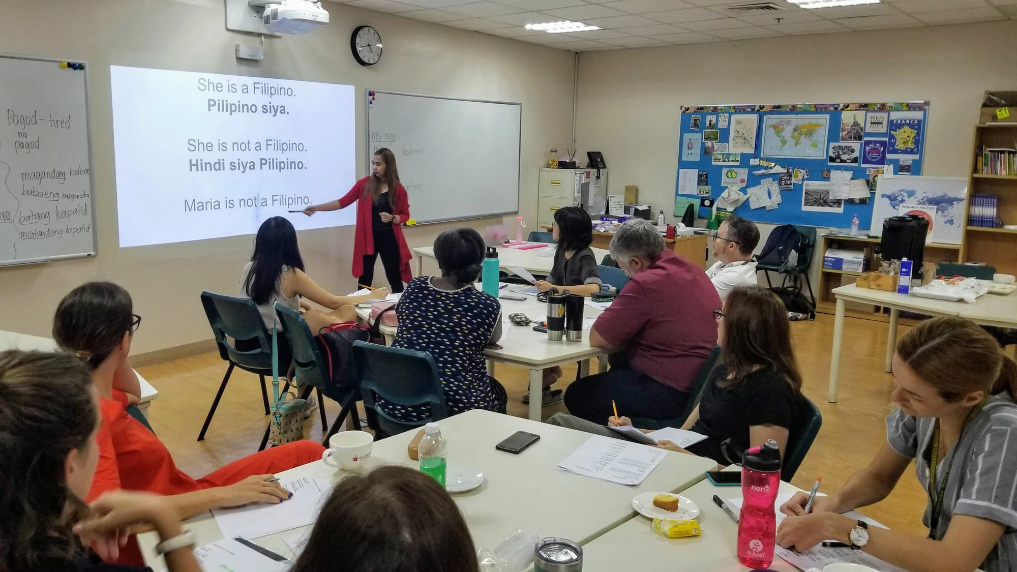teacher-eriza-teaching-filipino-language-to-expat-teachers-in-a-classroom